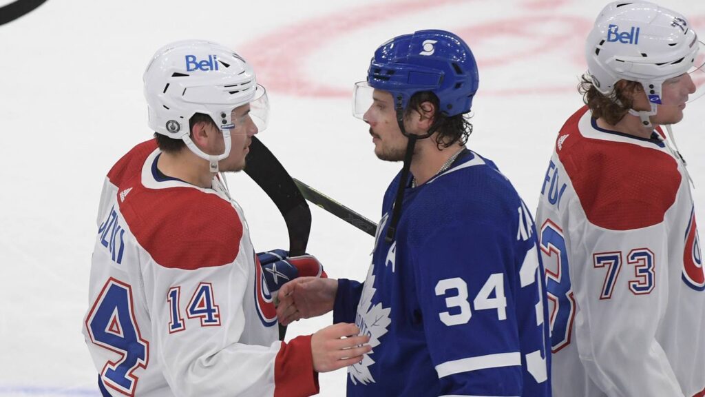 May 31, 2021; Toronto, Ontario, CAN; Toronto Maple Leafs forward Auston Matthews (34) congratulates Montreal Canadiens forward Nick Suzuki (14) after the Canadiens beat the Leafs 3-1 in game seven of the first round of the 2021 Stanley Cup Playoffs at Scotiabank Arena. Mandatory Credit: Dan Hamilton-USA TODAY Sports