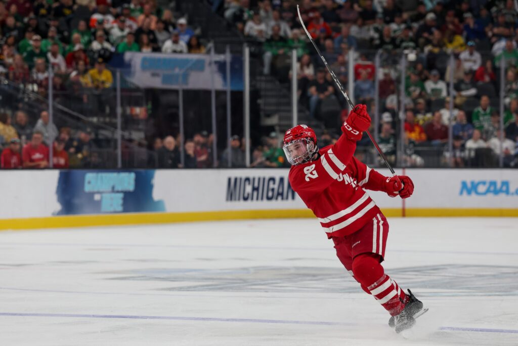 Wisconsin Badgers defenceman Aiden Dubinsky follows through on a shot during an NCAA semifinal game against the North Dakota Fighting Hawks on April 9 at T-Mobile Arena in Las Vegas.