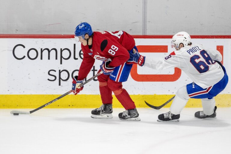 Owen Protz, right, skates after defenceman Tim Runtso,left, during development camp in Brossard this past July.