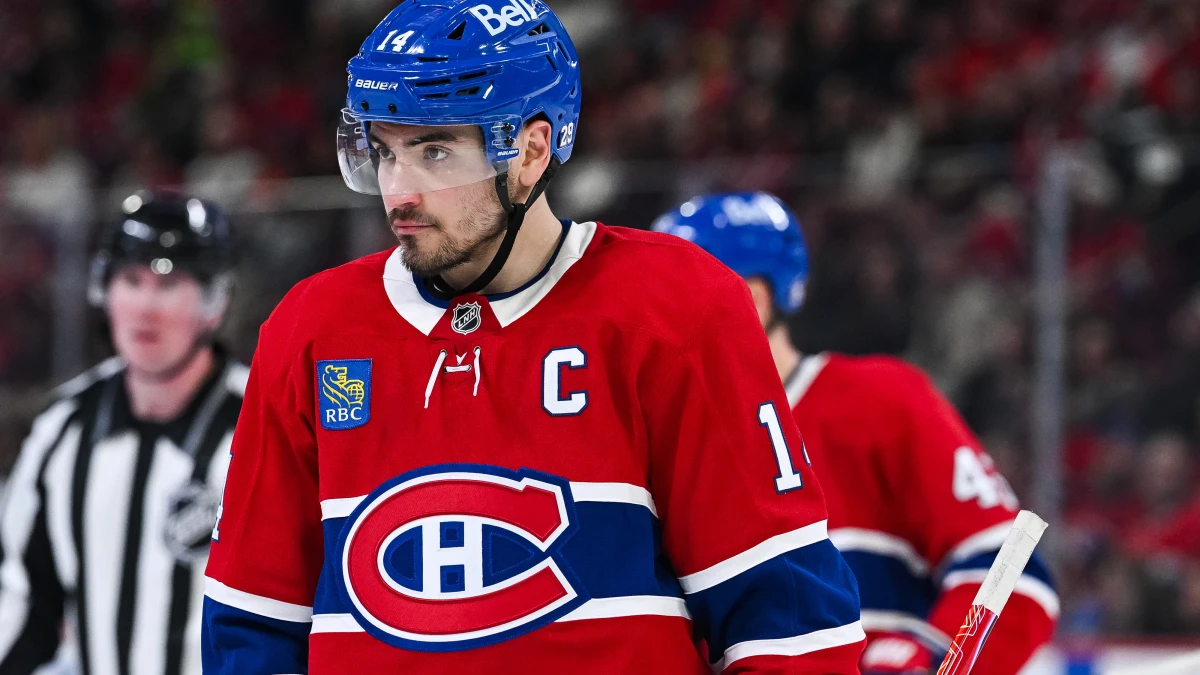 Montreal Canadiens center Nick Suzuki (14) looks on against the Detroit Red Wings during the third period at Bell Centre.