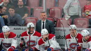 Montreal Canadiens head coach Martin St-Louis watches from the bench against the Florida Panthers during the third period at Amerant Bank Arena.
